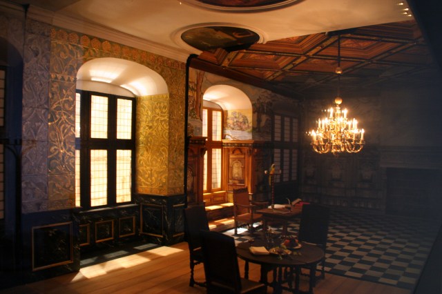 Plaster ceilings with inlaid paintings post-fire, wooden ceilings pre-fire