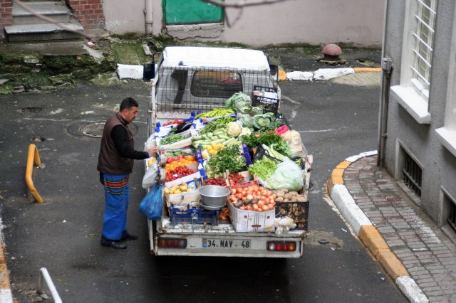 Morning street vendor below our apartment