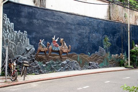 Bas relief on wall behind St. Joseph's Cathedral